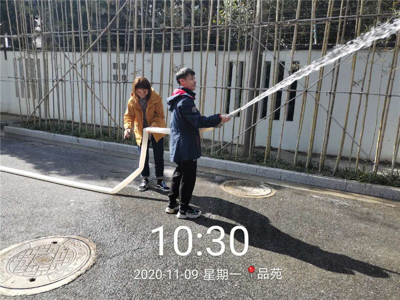 楼内租户进行消防水带实操_副本.jpg